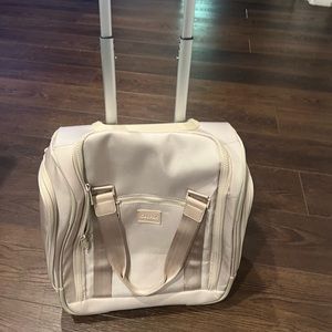 Calpak small roller suitcase